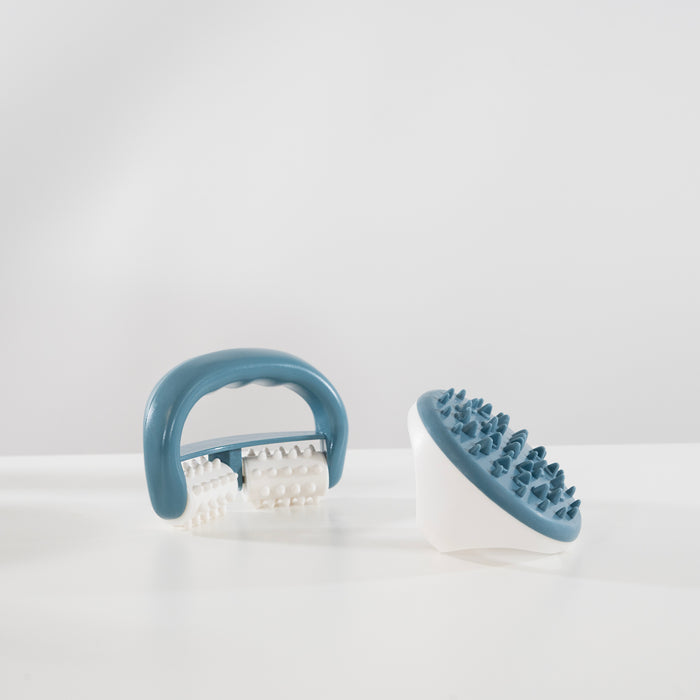 Blue and white facial massage roller with textured silicone nodules and a matching scalp massager for skin care routines