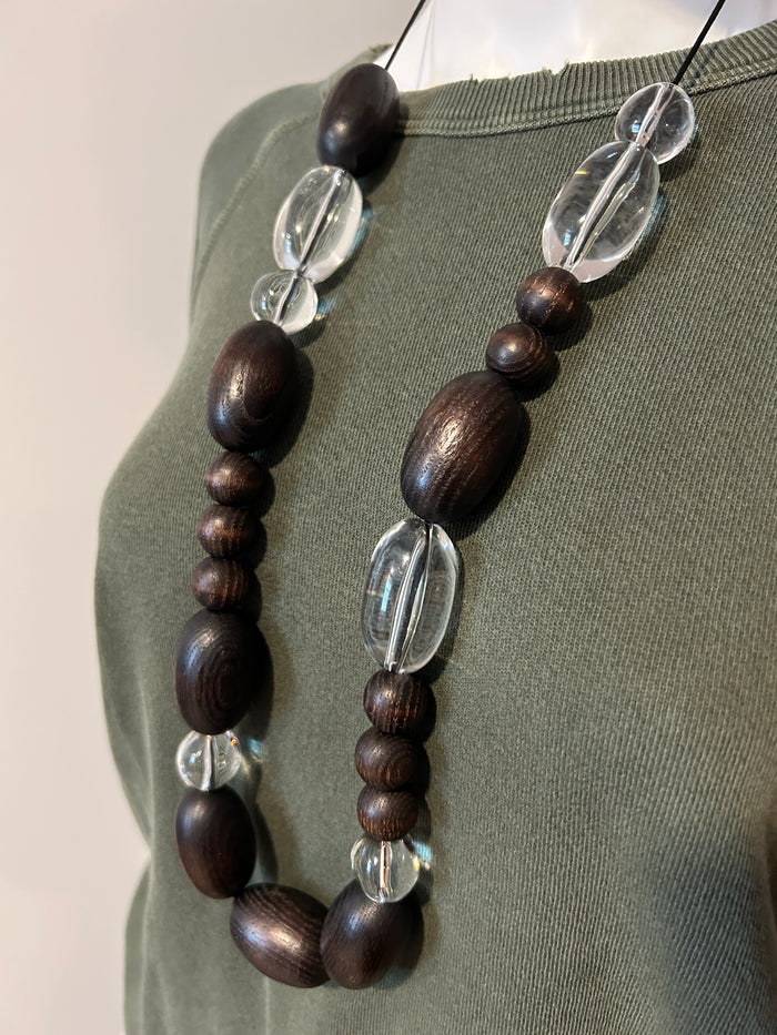 A.P.C. bead necklace with colorful round beads, stylish jewelry accessory, featuring vibrant bead design and modern aesthetic.