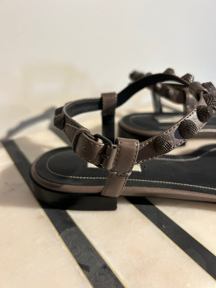 Balenciaga Arena sandals in size 35.5, featuring a stylish design with straps and logo details, displayed on a clean background.