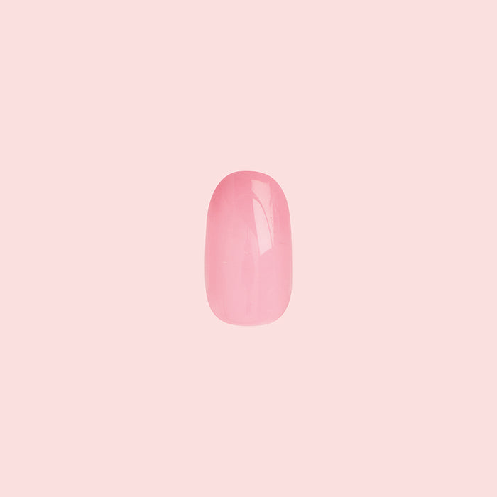 JM | Round | Short single press-on nail in pinky lavender shade with peony undertone for at-home manicure use