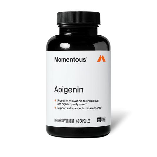 Momentous Apigenin supplement bottle, a 60-capsule sleep and stress support supplement delivering 50 mg of apigenin per capsule. Apigenin is a naturally occurring flavonoid found in chamomile that supports deeper, more restorative sleep and a calmer nervous system. NSF Certified for Sport, gluten free, and non-GMO.