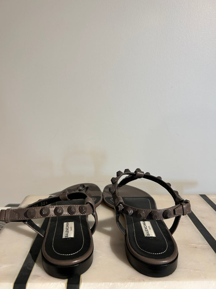 Balenciaga Arena sandals in size 35.5, featuring a sleek design with the brand's signature style, displayed on a plain background.