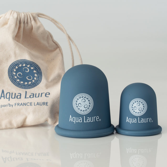 Two Aqua Laure menstrual cups in blue silicone with storage pouch, eco-friendly period care by France Laure