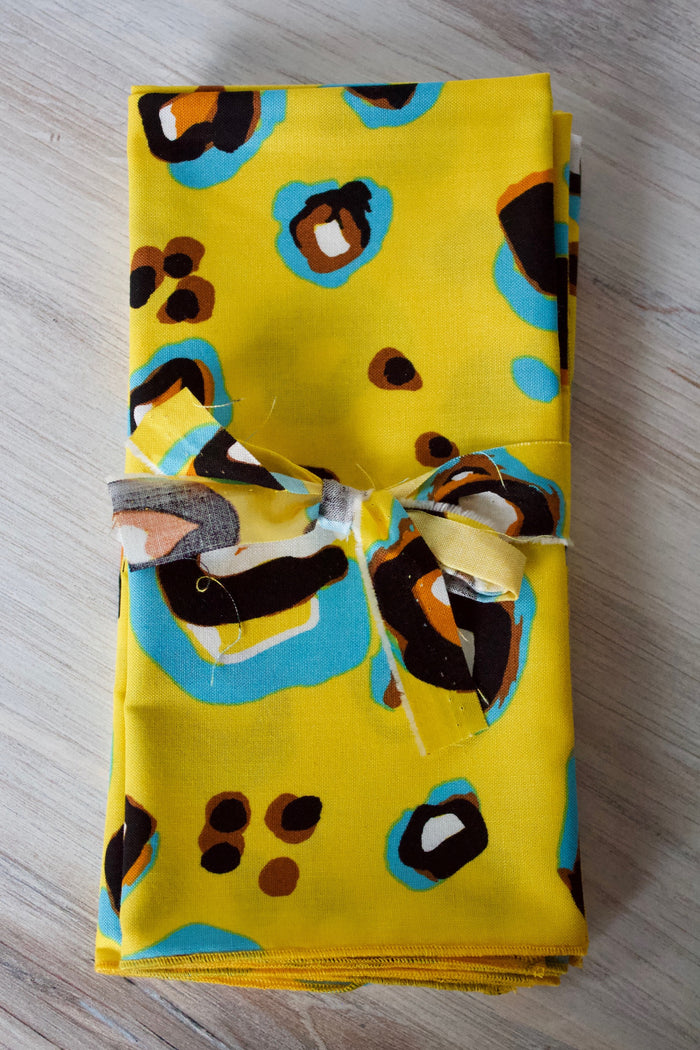 Spots Napkins - (Set of 4)-The Blue Peony-Category_Napkins,Category_Table Linens,Color_Black,Color_Yellow,Department_Kitchen,Material_Cotton,Pattern_Animal Print