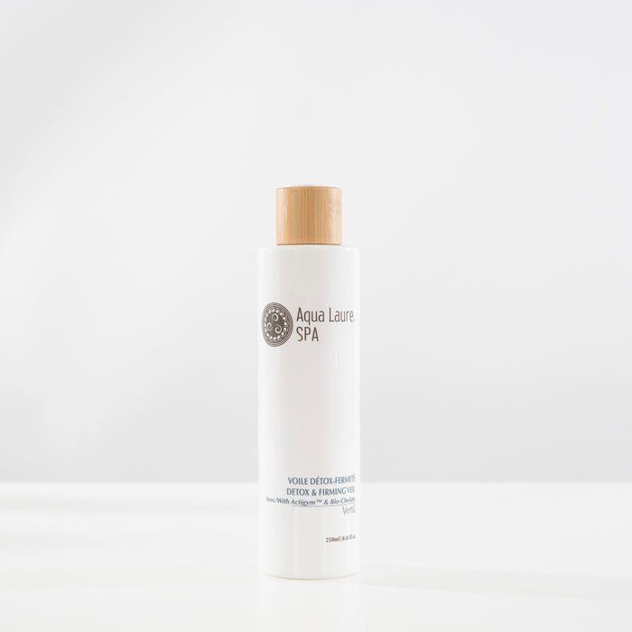 Aqua Laure SPA Detox & Firming Veil in white bottle with bamboo cap, featuring Actigym™ for skin purification and tone enhancement.