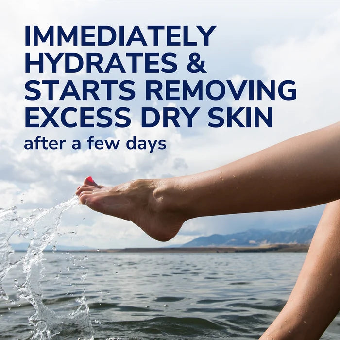 Rinsing foot with water outdoors, showing splash and hydration on bare skin