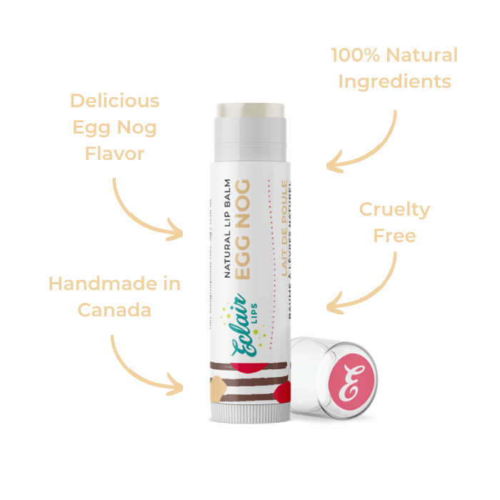 Lip balm tube labeled Egg Nog with cap beside it.