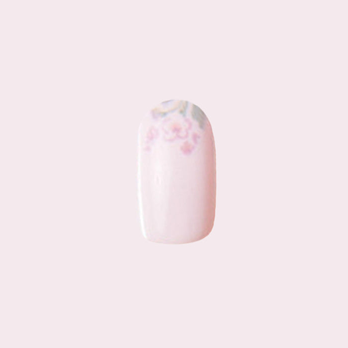 Single nail with Faded Florals - Press-On | Short | Round featuring a soft pink base and faded floral tip design