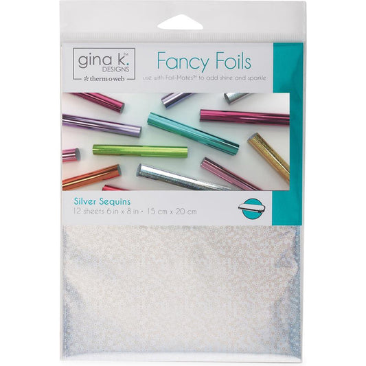 Gina K Designs - Fancy Foil 6"X8" - 12/Pkg - Silver Sequins. Add vibrant color and brilliant shine to any project! Can be used as a toner-reactive foil or a textile foil. This package contains twelve 6x8 inch pieces of foil. Made in USA. Available at Embellish Away located in Bowmanville Ontario Canada.