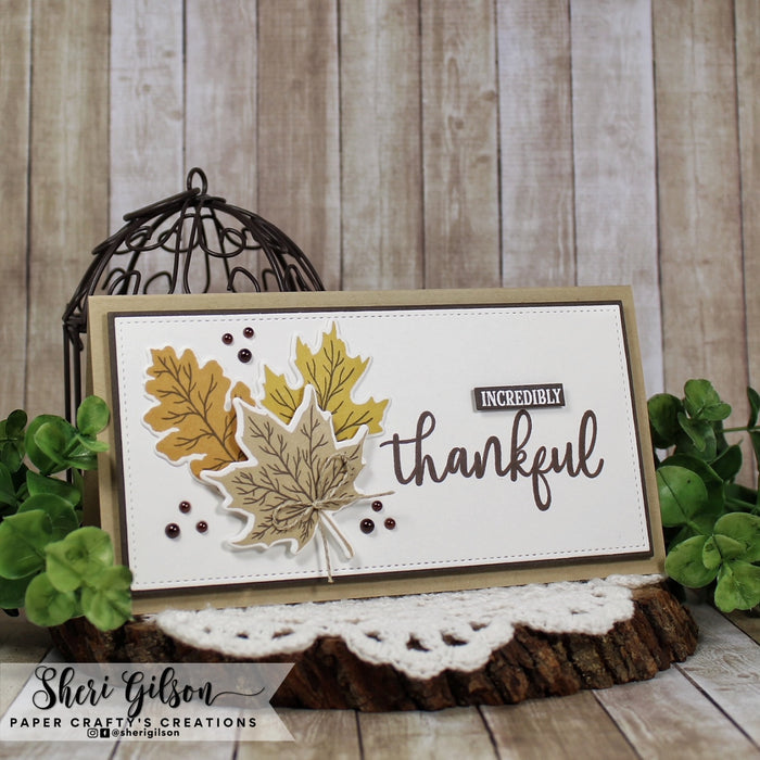 Gina K. Designs - Stamps - Layered Leaves. Layered Leaves is a stamp set by Hannah Drapinski. This set is made of premium clear photopolymer and measures 6" X 8". Made in the USA. Available at Embellish Away located in Bowmanville Ontario Canada. Card design by Shari Gilson.