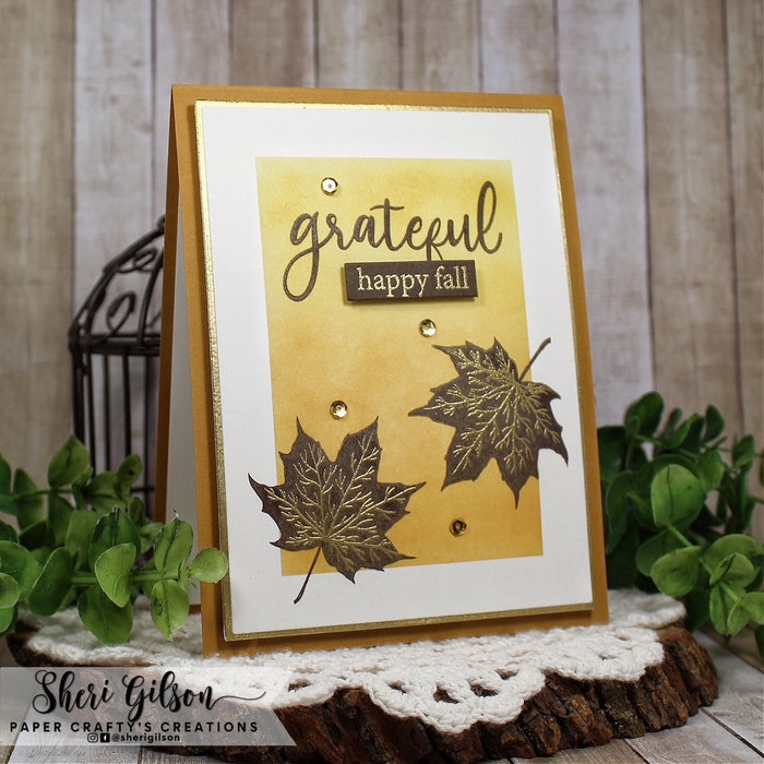 Gina K. Designs - Stamps - Layered Leaves. Layered Leaves is a stamp set by Hannah Drapinski. This set is made of premium clear photopolymer and measures 6" X 8". Made in the USA. Available at Embellish Away located in Bowmanville Ontario Canada. Card design by Shari Gilson.