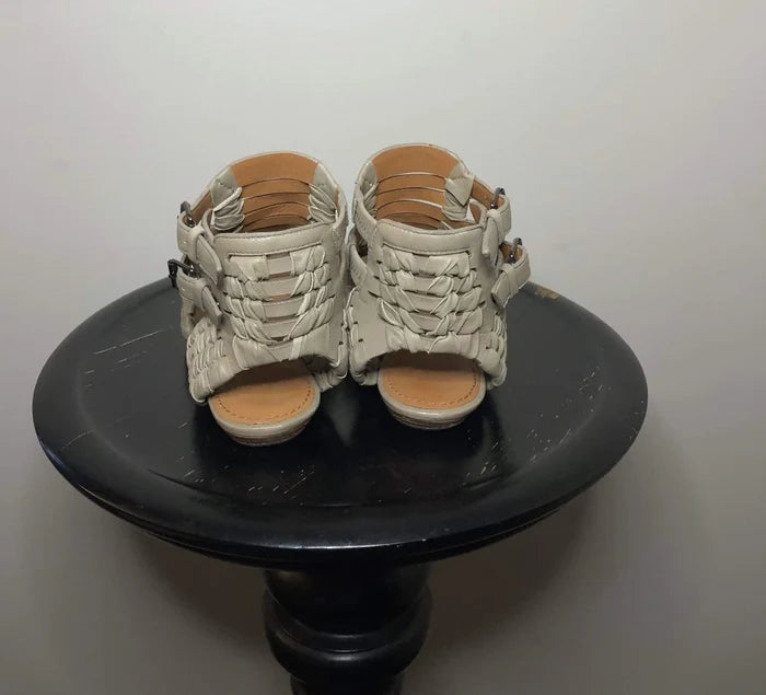 Givenchy taupe leather cage gladiator sandals in size 35 with strappy design and open toe style.