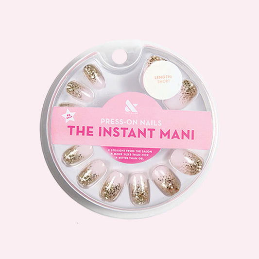 Half Moon Glitter Gradient | Round | Short press-on nails featuring a gold glitter gradient for an easy at-home mani by Olive and June