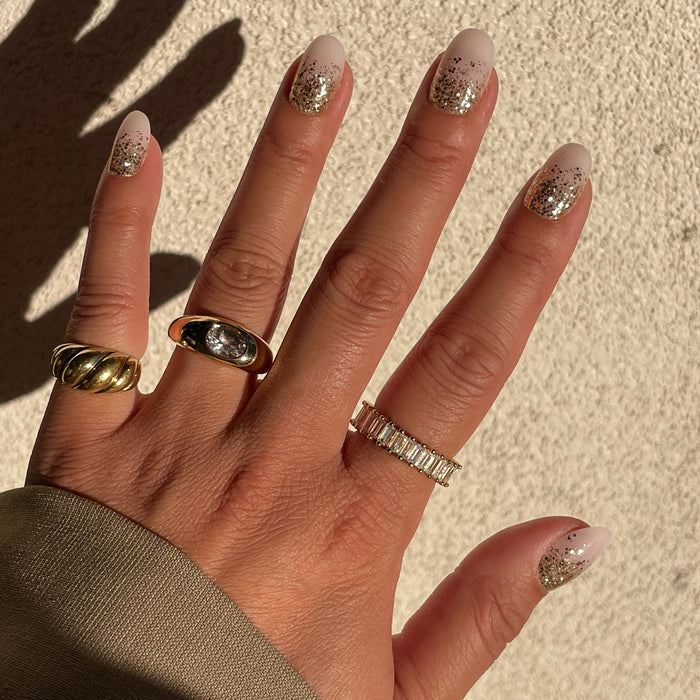 Half Moon Glitter Gradient | Round | Short press-on nails with glitter fading from base to tip for an easy at-home manicure