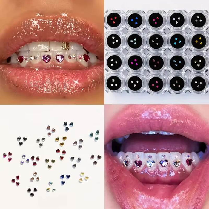 Array of LaserGlow heart-shaped tooth gems in clear, ruby, champagne, and aurora hues.