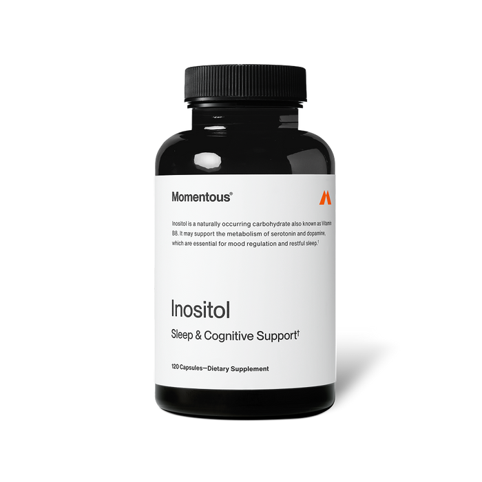 Black bottle of Momentous Inositol on a black background. Label reads: “Momentous,” “Inositol is a naturally occurring carbohydrate also known as Vitamin B8. It may support the metabolism of serotonin and dopamine, which are essential for mood regulation and restful sleep†.” Product name reads: “Inositol,” “Sleep & Cognitive Support†,” and “120 Capsules—Dietary Supplement.”