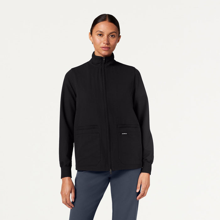 JAANUU Ceri Essential 6 - Pocket Scrub Jacket Black - Get Scrubbed