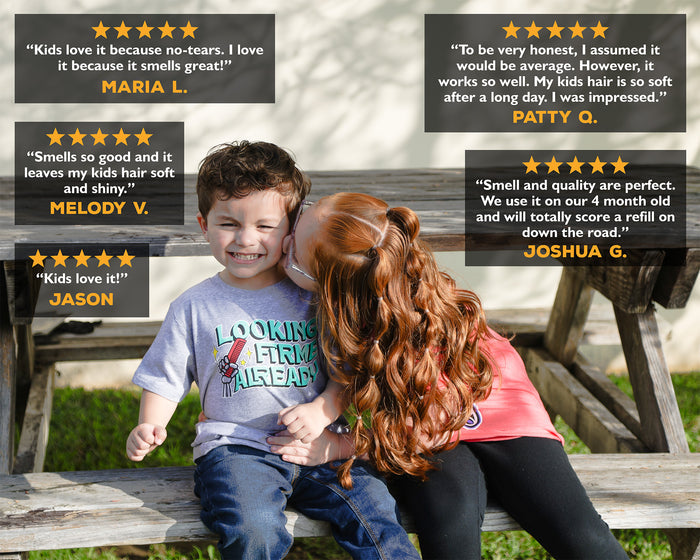 Two children sitting on a picnic bench with product reviews displayed above them.