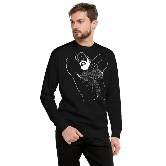 Man wearing black unisex premium crewneck sweatshirt with white queer bear art by Kinky Needles, available at Adam's Nest in Provincetown