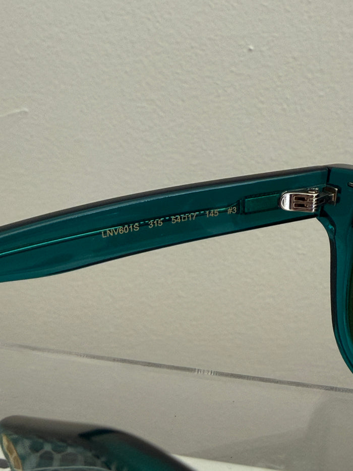 Lanvin Lloyd sunglasses with dark tinted lenses and sleek black frames, stylish accessories for sun protection.