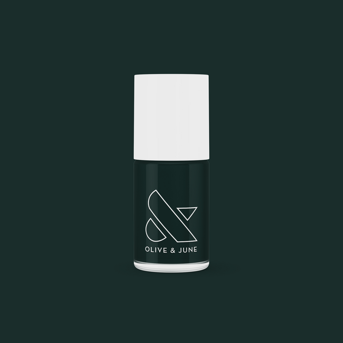 Olive and June LL gel polish bottle in deep shimmering emerald green for long-lasting at-home manicure and pedicure
