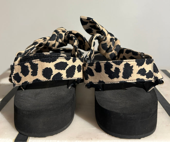 Loeffler Randall animal print sandals in size 7.5 with open toe design and stylish patterned straps.