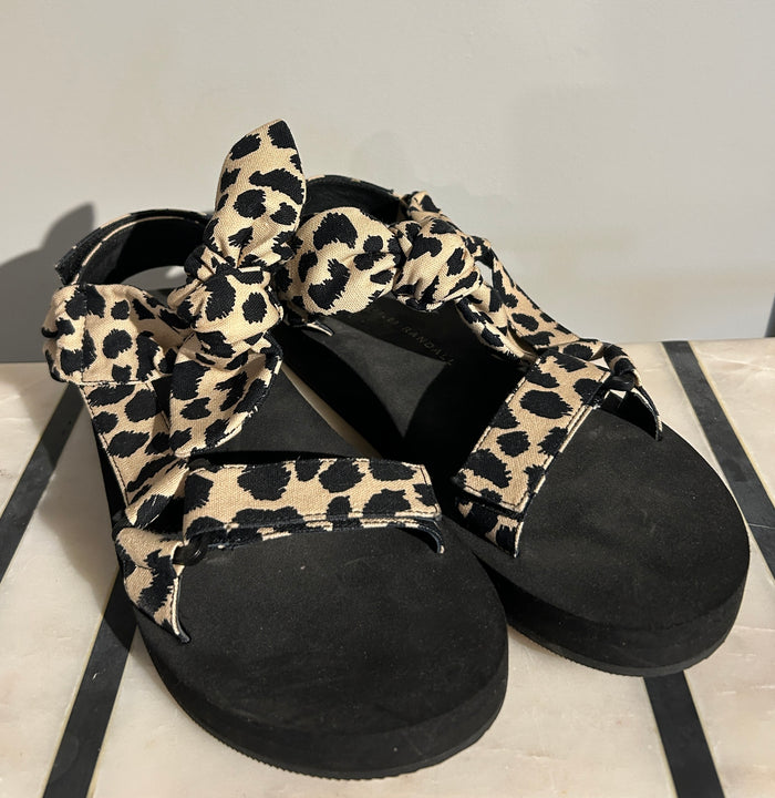 Loeffler Randall animal print sandals in size 7.5, featuring stylish slip-on design and bold animal pattern on a comfortable shoe.