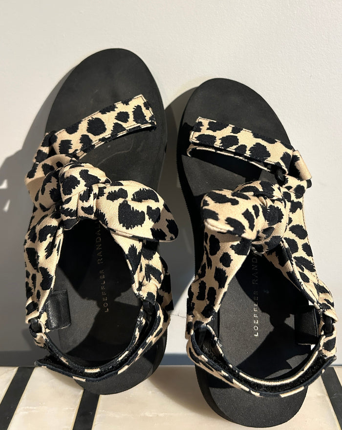 Loeffler Randall animal print sandals in size 7.5 featuring a stylish strappy design and bold pattern.