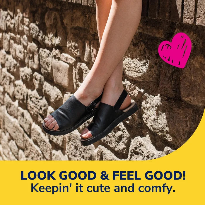 3/4 length cushioning insole inserts shown with black slide sandals on stone steps