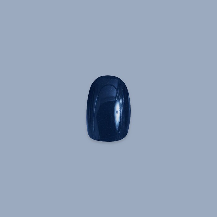 Make a Res | Round | Extra Short rich dark navy press-on nail in an extra short round shape for an easy at-home mani