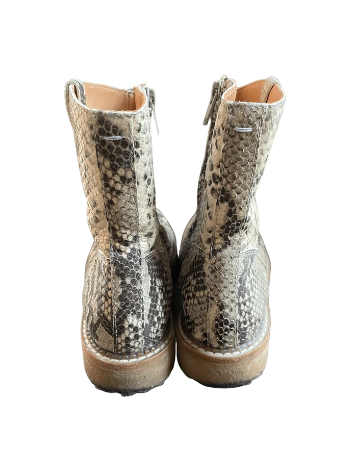 Maison Martin Margiela snakeskin ankle boots in size 35.5 featuring a sleek design and textured snakeskin pattern.