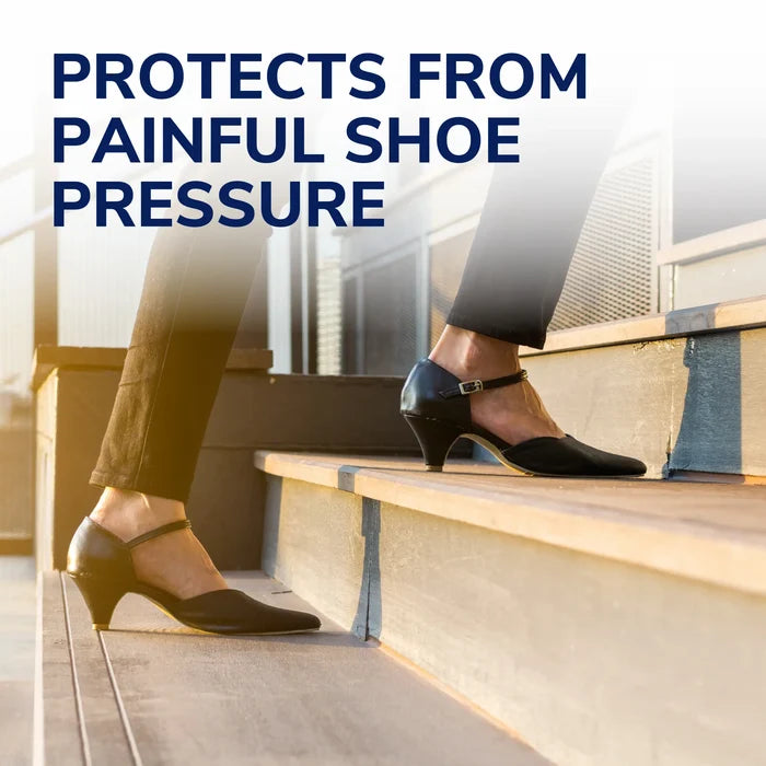 Moleskin padding strips on a foot inside a shoe, helping protect from shoe pressure