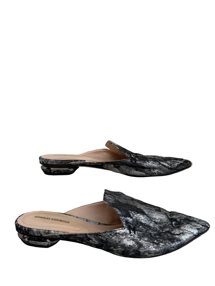 Silver Nicholas Kirkwood flat mule shoes, size 38, with sleek design and pointed toe, displayed on neutral background.