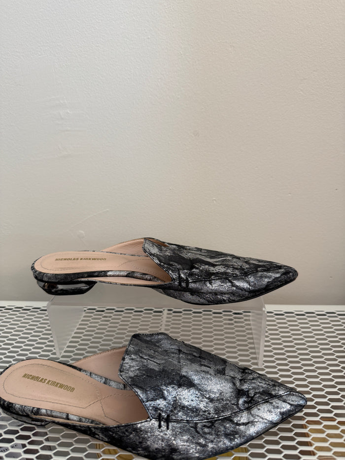 Nicholas Kirkwood silver flat mule shoes size 38, stylish slip-on footwear with sleek metallic finish and pointed toe design.