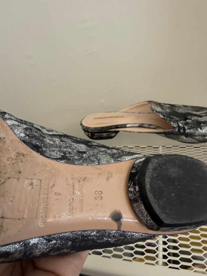 Silver Nicholas Kirkwood flat mule shoes, size 38, featuring a sleek design and comfortable slip-on style.