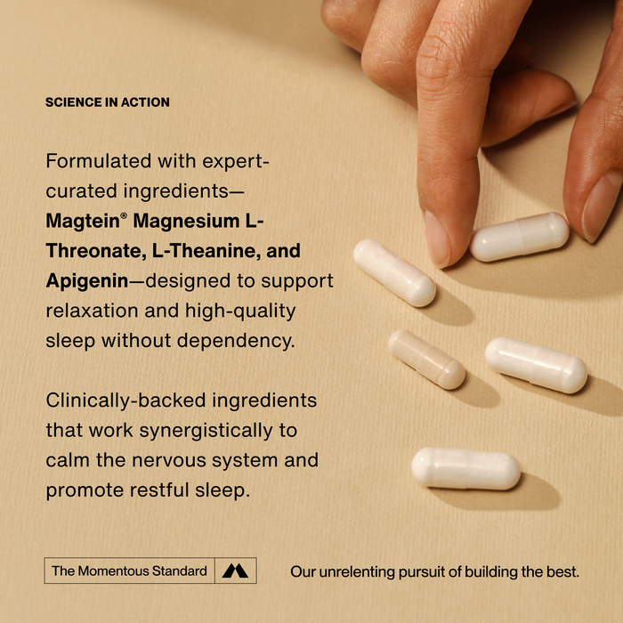 Text reads: “SCIENCE IN ACTION Formulated with expert-curated ingredients—Magtein® Magnesium L-Threonate, L-Theanine, and Apigenin—designed to support relaxation and high-quality sleep without dependency. Clinically-backed ingredients that work synergistically to calm the nervous system and promote restful sleep.” with capsules on surface.