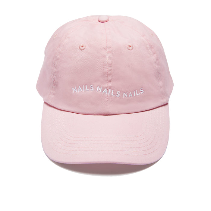O&J Nails Hat in soft pink cotton twill with embroidered Nails Nails Nails text and adjustable strap closure