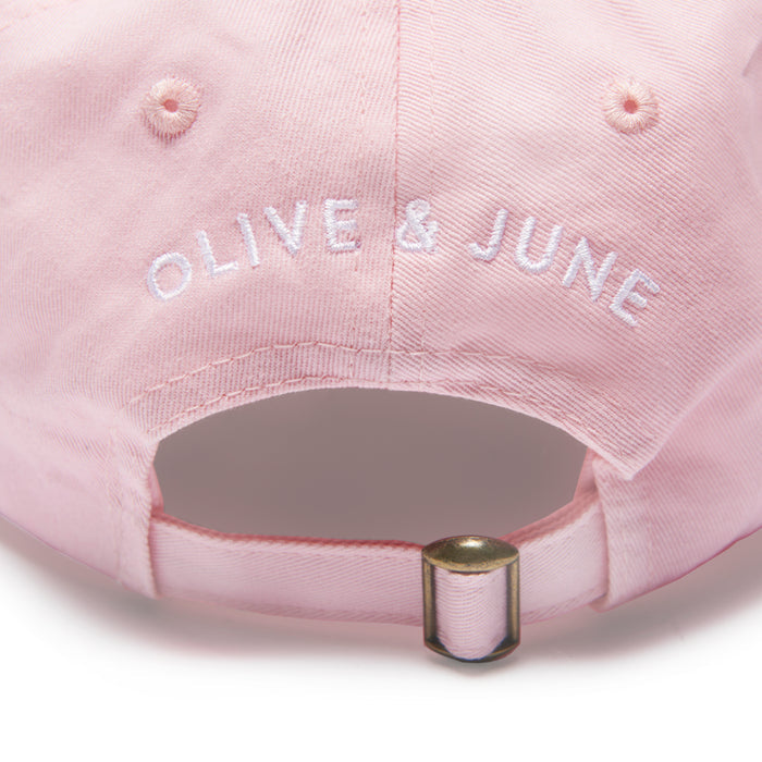 O&J Nails Hat in light pink cotton twill with adjustable back strap and white Olive & June embroidered logo