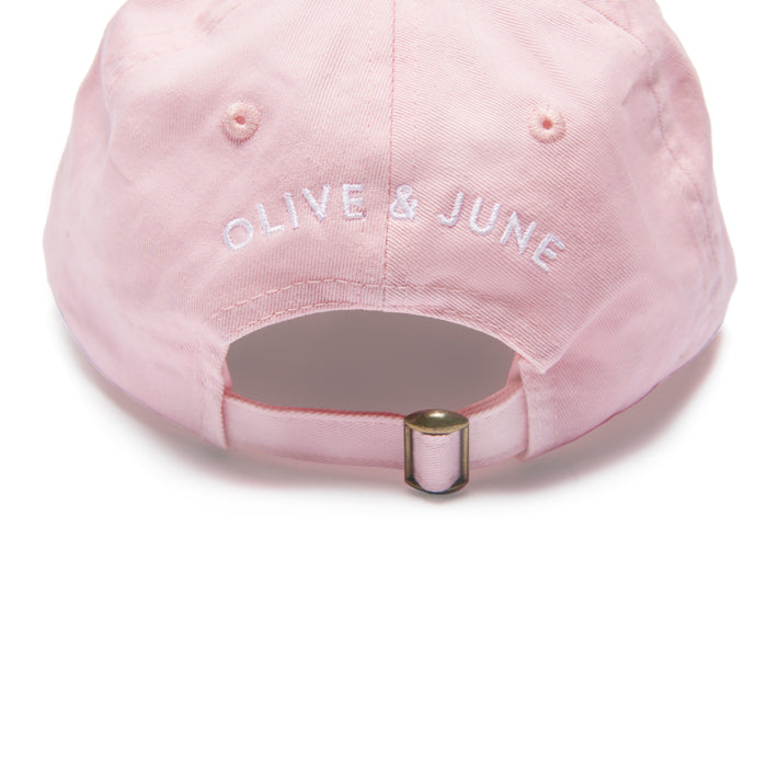O&J Nails Hat in pink cotton twill with adjustable metal strap and Olive & June embroidered on back