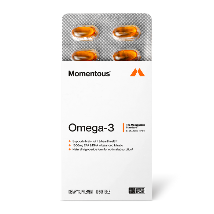 Momentous Omega-3 supplement packet containing four golden capsules in blister pack with product information and branding.