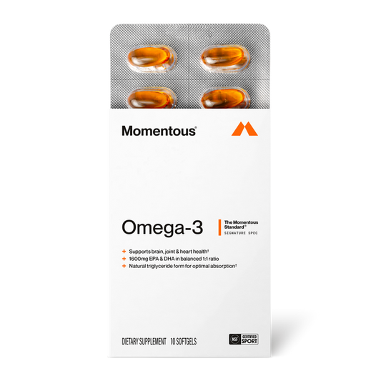 Momentous Omega-3 supplement packet containing four golden capsules in blister pack with product information and branding.