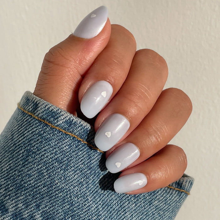 Periwinkle Vampy Heart | Round | Short press-on nails in soft periwinkle with white heart accents for a charming mani
