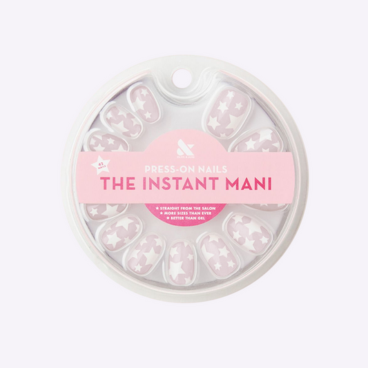 Pink Goldfish Super Stars | Round | Short press-on nails with white star pattern on lavender base for quick mani