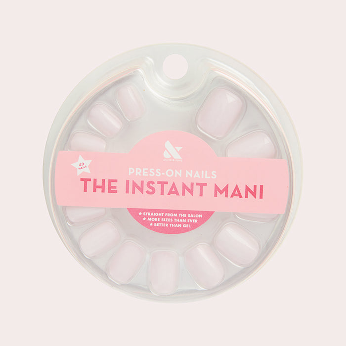Pink Sands | Round | Short press-on nails in sun-bleached pink for an easy and glowing at-home manicure experience