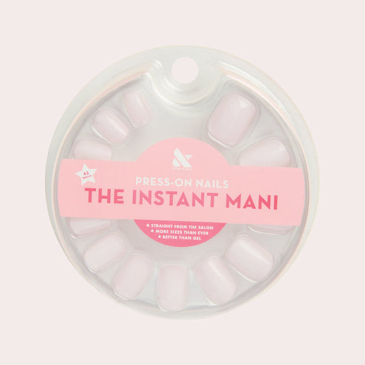 Pink Sands | Round | Short press-on nails in sun-bleached pink for an easy and glowing at-home manicure experience