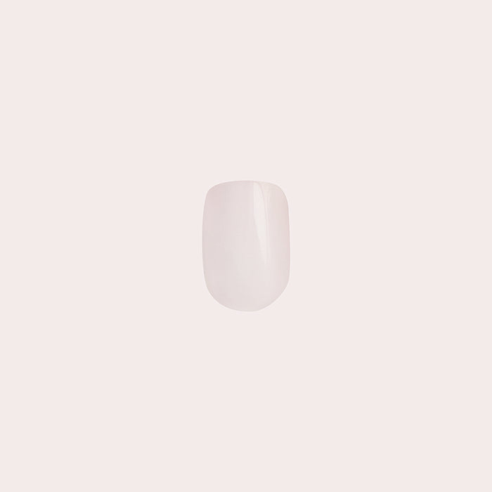Pink Sands | Round | Short smooth sun-bleached pink press-on nail for quick and easy at-home mani application