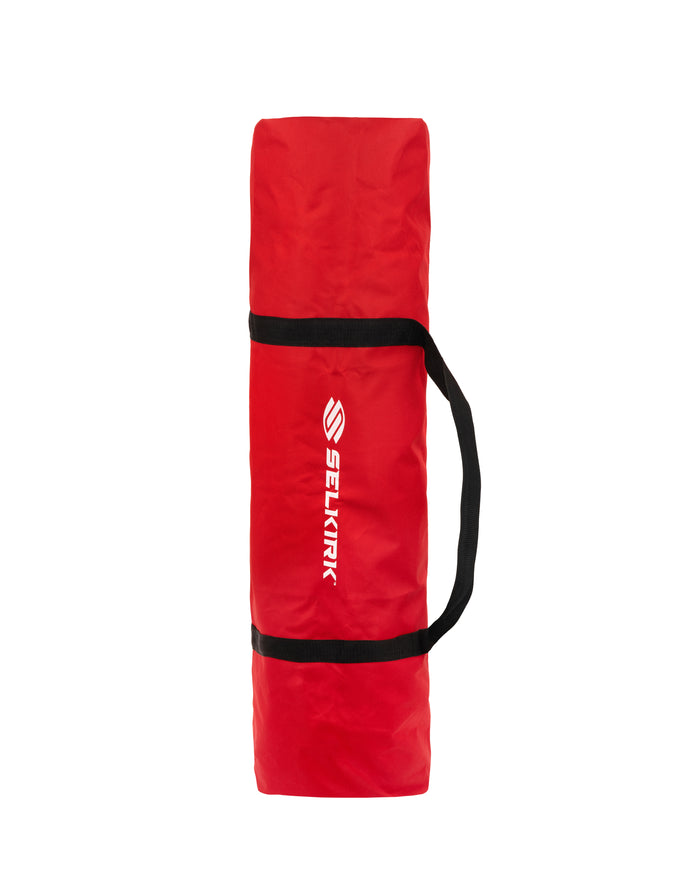 Red padded paddle bag with black carry straps and white SELKIRK logo