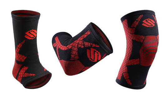 Black and red compression sleeves for knee, elbow, and ankle with geometric knit pattern and stylized S logo