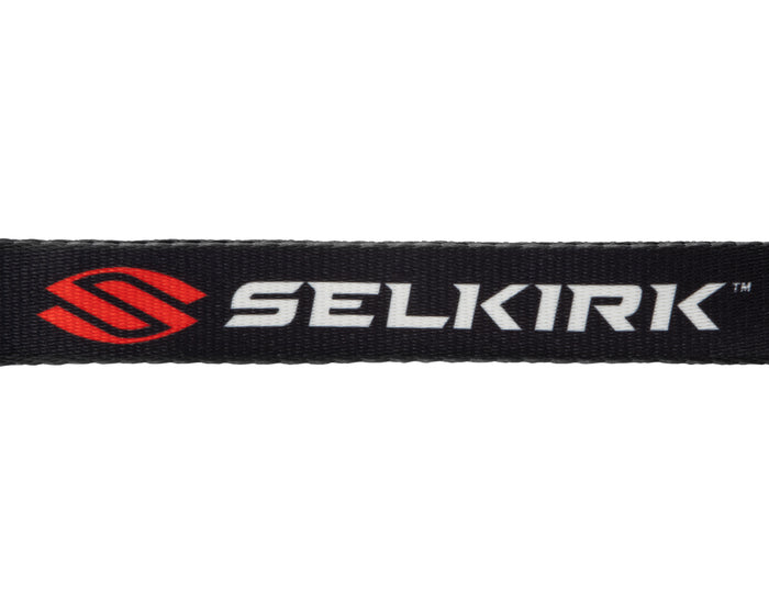 Black woven strap with red emblem and white SELKIRK text, including TM mark