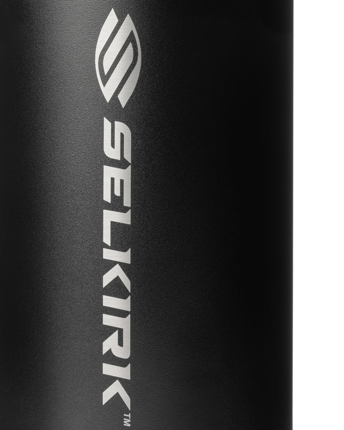 Vertical SELKIRK wordmark and logo on black textured cylinder, close-up; visible text: SELKIRK TM